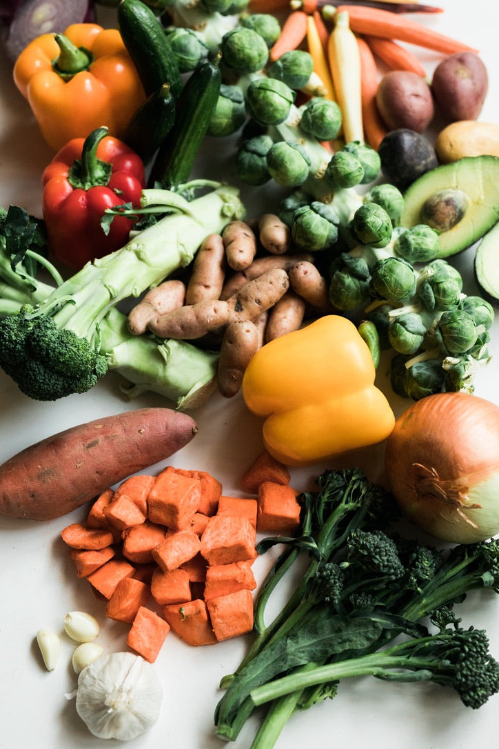 A table full of bright coloured vegetables