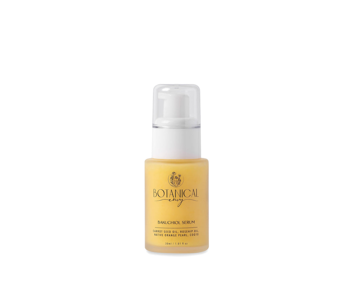 A bottle of Botanical Beauty Bakuchiol Serum with a pale yellow liquid, a white pump dispenser, and a clear cap, on a plain white background.