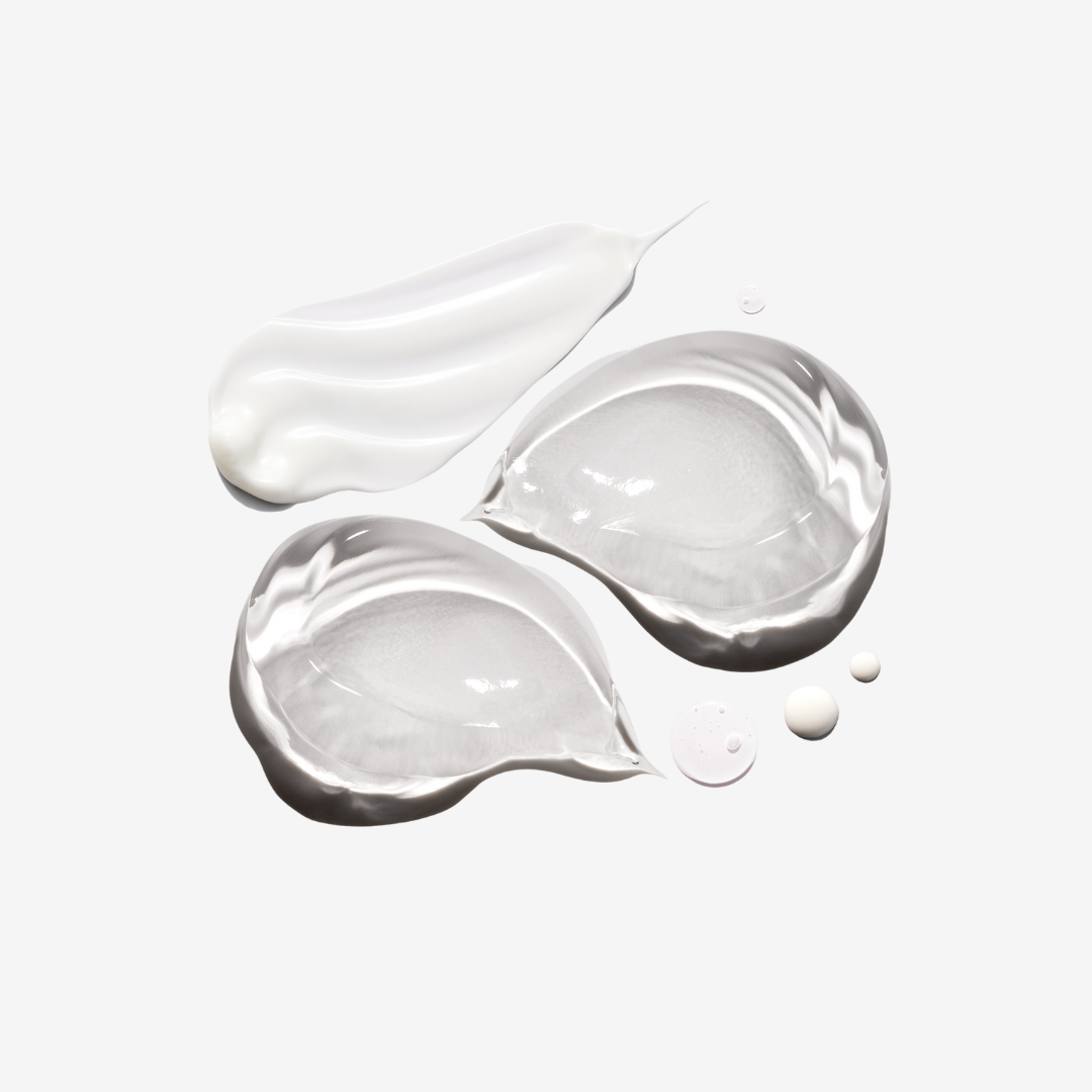 Three swatches of clear serum and cream on a white background.