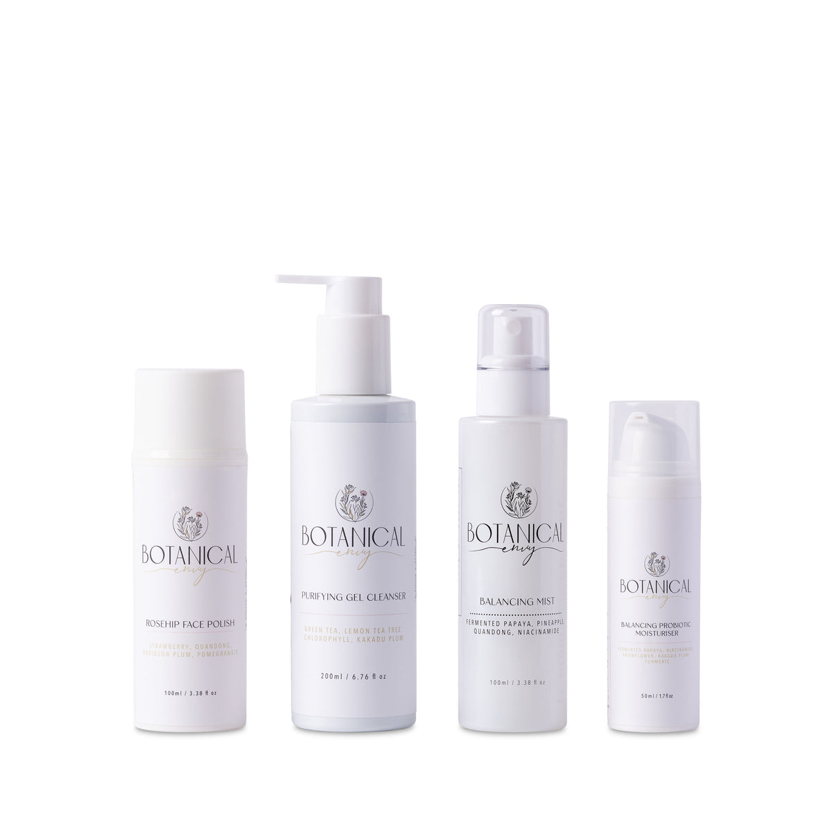 A collection of four skincare products in a row against a white background