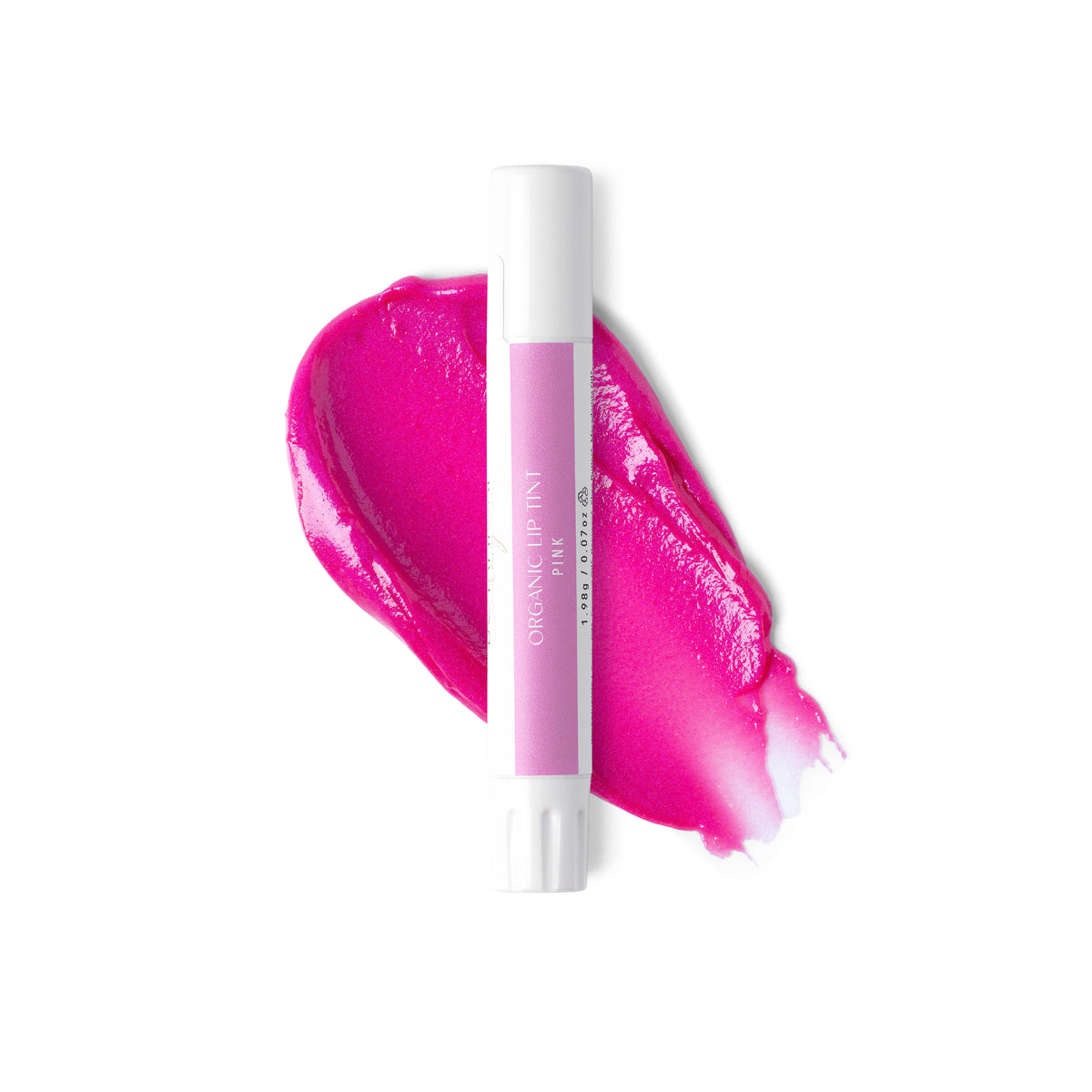 A white tube of pink lip tint against a swatch of colour and a white background